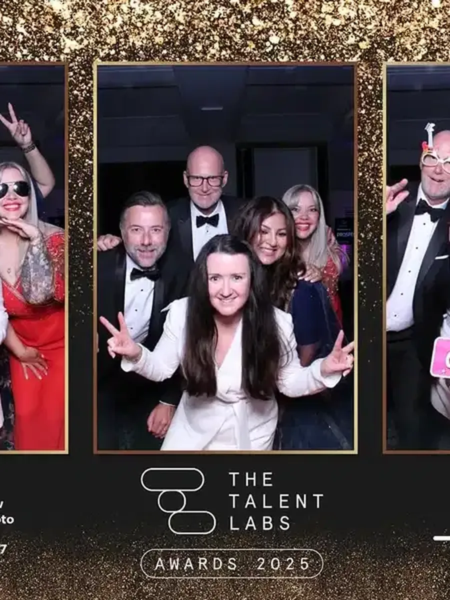 Guests posing together at Brand activation booth