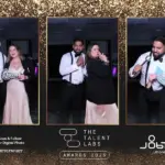 a couple posing together at private party photo booth