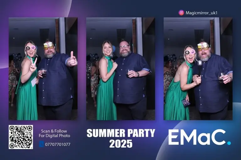 Guests posing together at a summer party photo booth