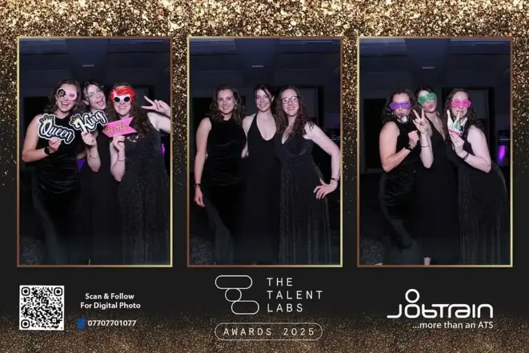 Guests posing together at private party photo booth
