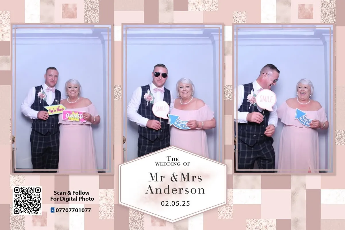 Wedding guests posing with props in a Magic Mirror photo booth