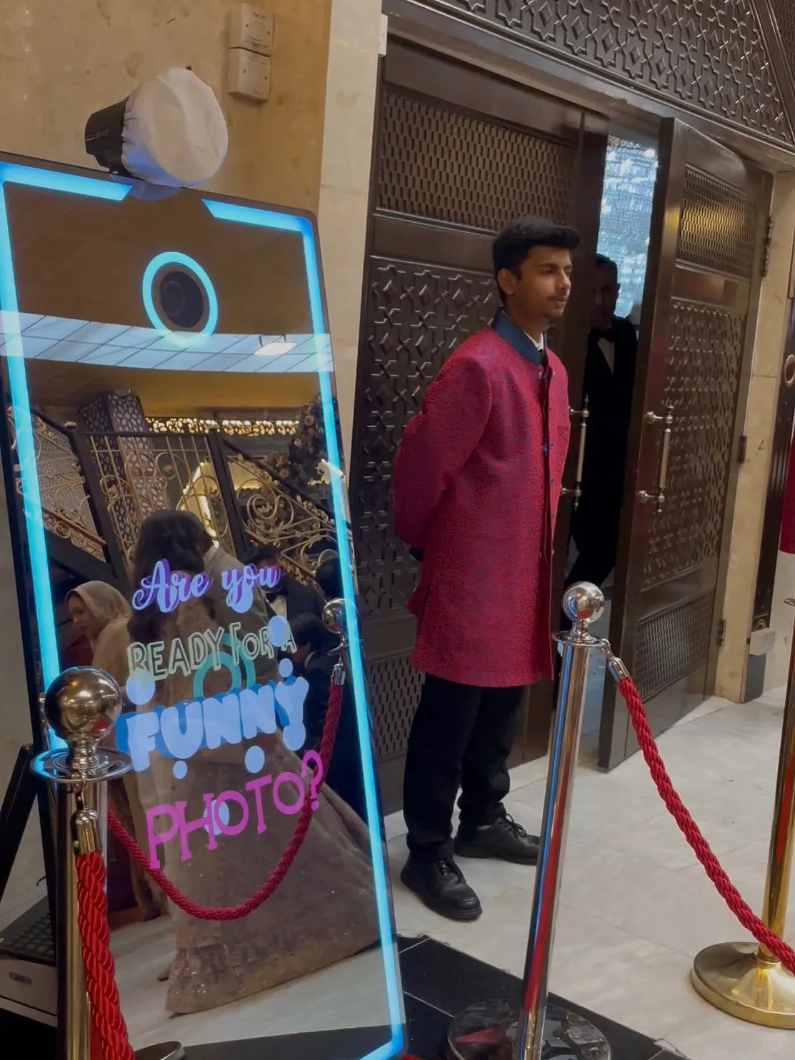 Props and novelty glasses arranged for a Magic Mirror photo booth table